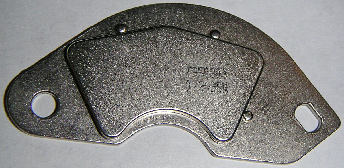 Neodymium magnet attached to a shaped steel bracket from a computer hard drive
